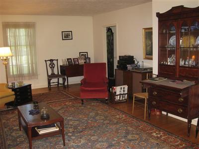 1323 County Road Cataumet, MA 02534 - Photo 5 of 22 a living room with furniture a large window and a dining table