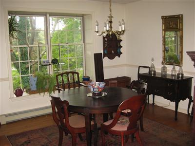 1323 County Road Cataumet, MA 02534 - Photo 7 of 22 a view of a dining room with furniture window and outside view