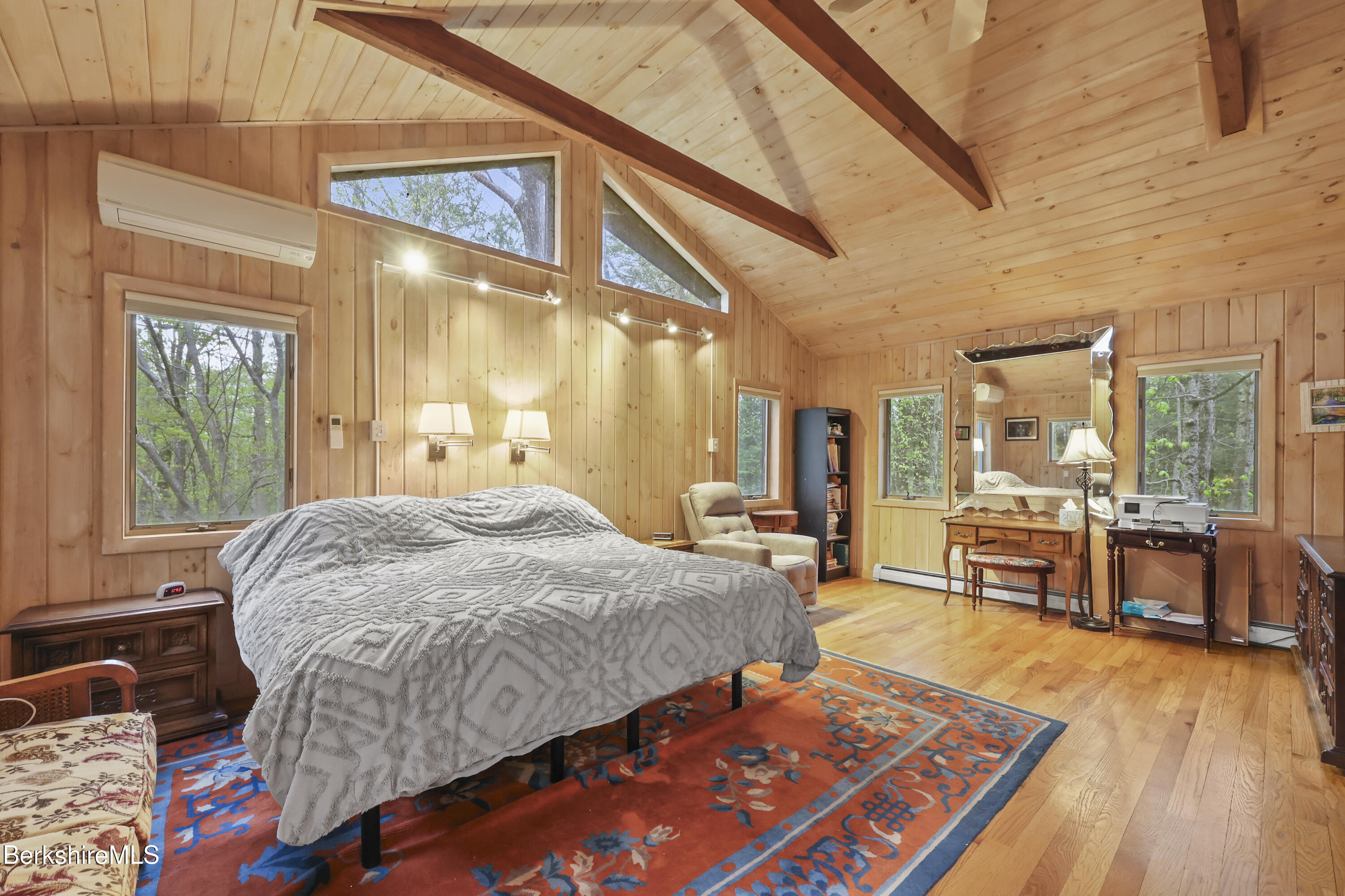 422 Bonny Rigg Hill Road Becket, MA 01223 - Photo 16 of 60 a bed sitting in a spacious bedroom next to a window