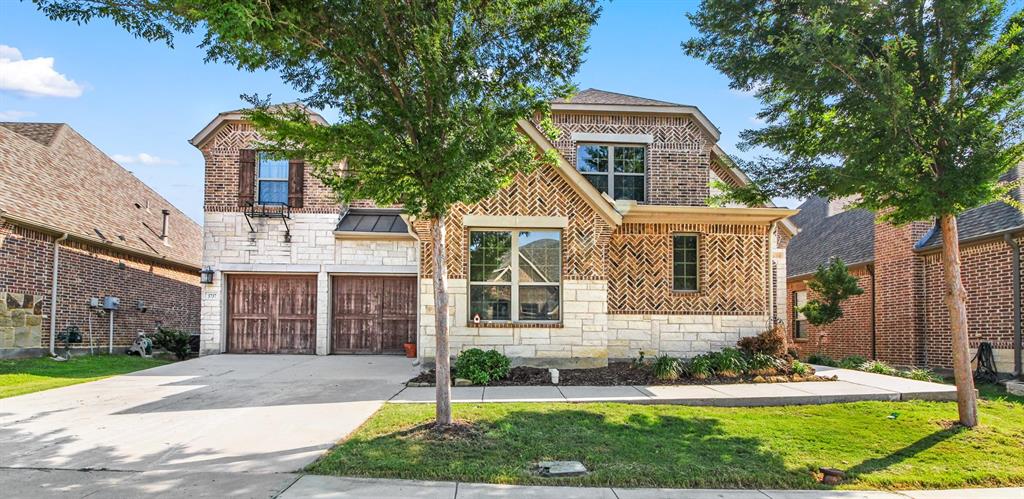 3737 Nottingham The Colony, TX 75056 - Photo 1 of 1 a front view of a house with garden