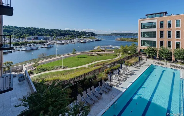 a view of swimming pool from a balcony