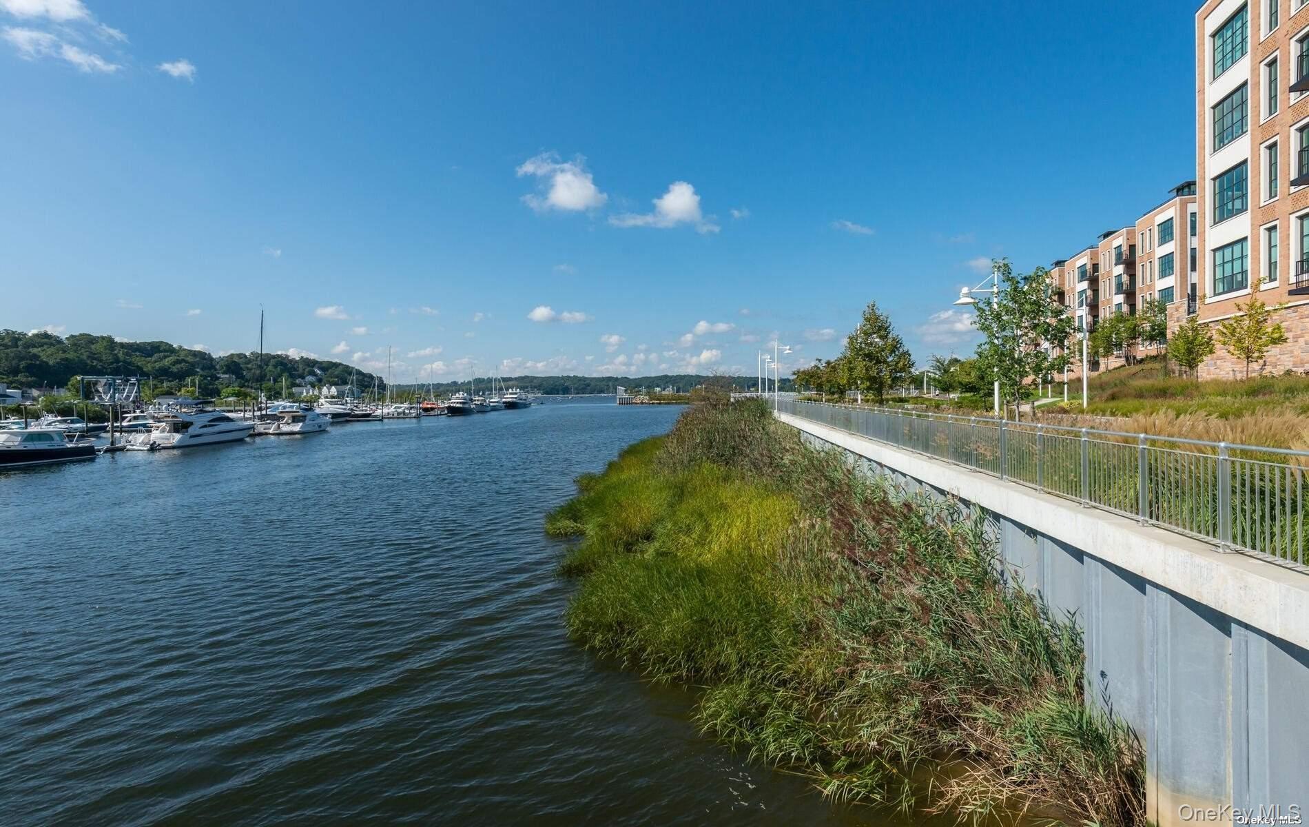 100 Garvies Point Road, Unit 1014 Glen Cove, NY 11542 - Photo 17 of 27 a view of a lake