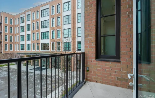 a view of a brick building from a window
