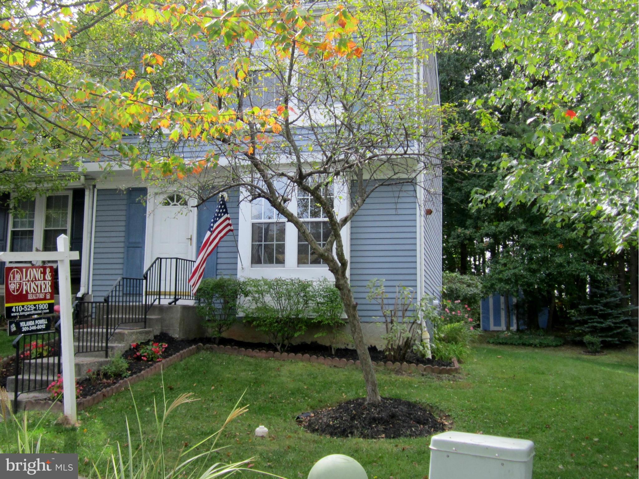 5021 Clifford Road Perry Hall, MD 21128 - Photo 1 of 15 a front view of a house with garden