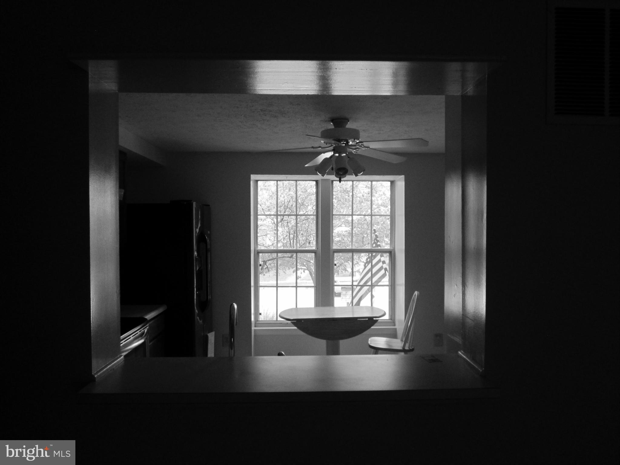 5021 Clifford Road Perry Hall, MD 21128 - Photo 5 of 15 a view of an empty room with a window