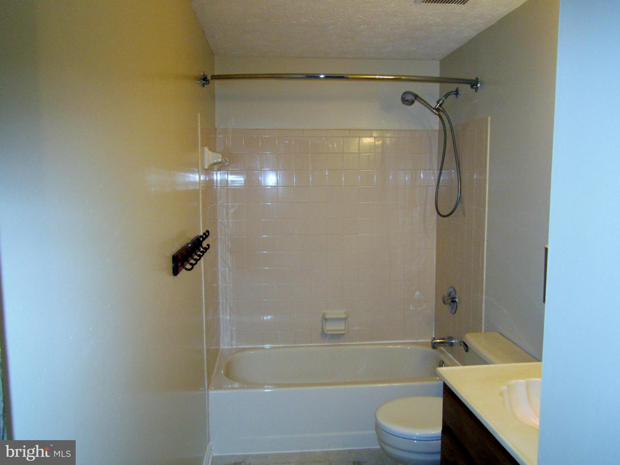5021 Clifford Road Perry Hall, MD 21128 - Photo 7 of 15 a bathroom with a shower and a toilet