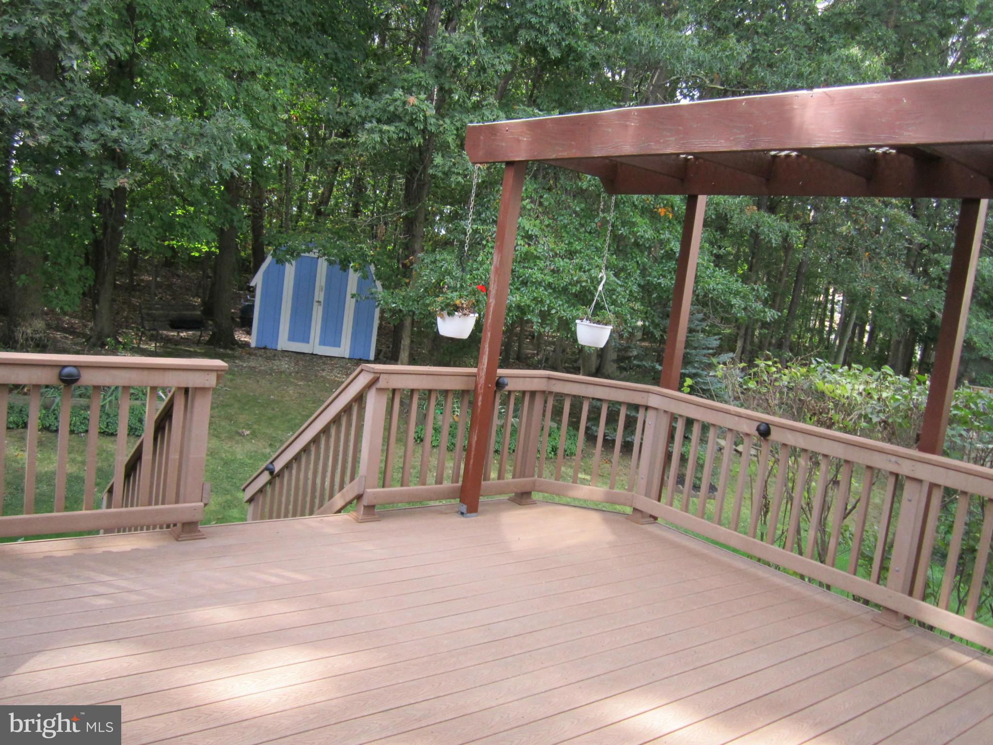5021 Clifford Road Perry Hall, MD 21128 - Photo 10 of 15 a view of a wooden deck and a backyard