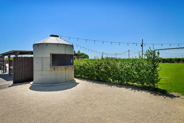 a backyard of a house with lots of green space