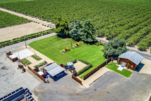 a backyard of a house with lots of green space