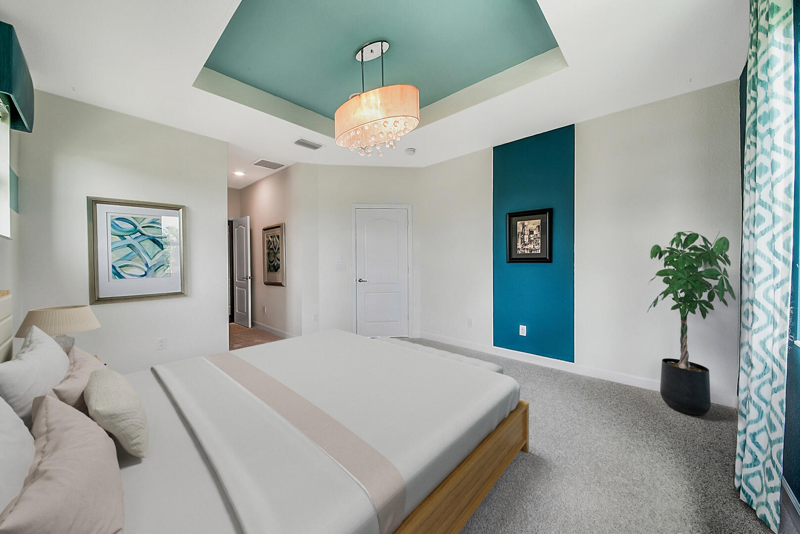 13076 Anthorne Lane Boynton Beach, FL 33436 - Photo 15 of 36 a bedroom with a bed and a chandelier