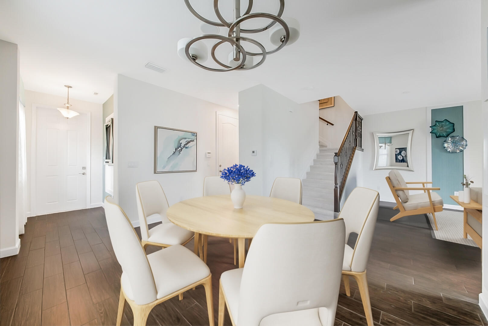 13076 Anthorne Lane Boynton Beach, FL 33436 - Photo 2 of 36 a view of a dining room with furniture wooden floor and a chandelier