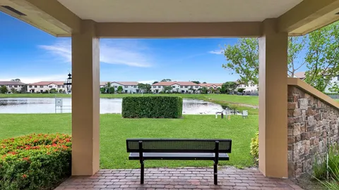 a view of a bench in front of building