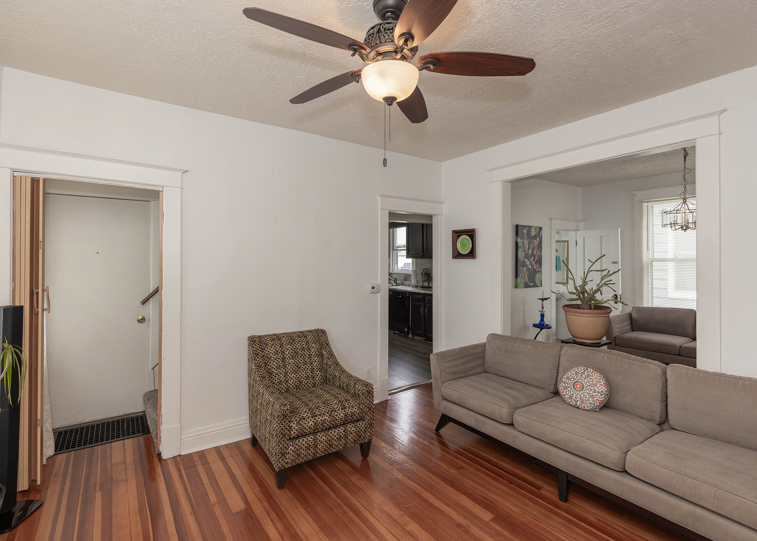 1839 15th Street Moline, IL 61265 - Photo 12 of 32 a living room with furniture and a wooden floor