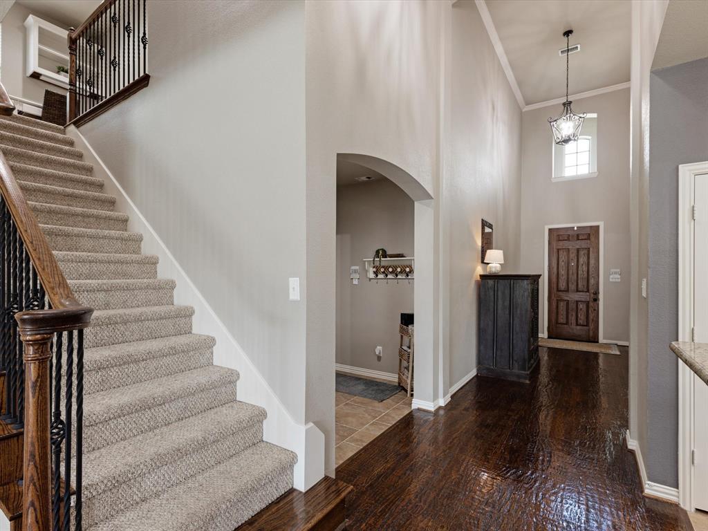 1120 Golden Sunset Court Prosper, TX 75078 - Photo 17 of 40 a view of entryway and hall with wooden floor