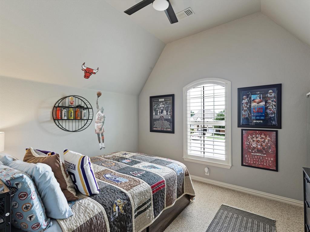 1120 Golden Sunset Court Prosper, TX 75078 - Photo 25 of 40 a bedroom with a bed and a window
