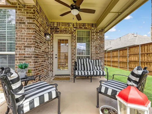 a view of a house with a back yard