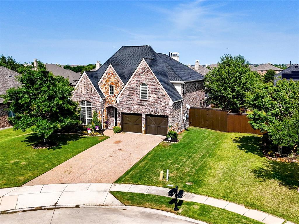 1120 Golden Sunset Court Prosper, TX 75078 - Photo 40 of 40 a front view of a house with a yard