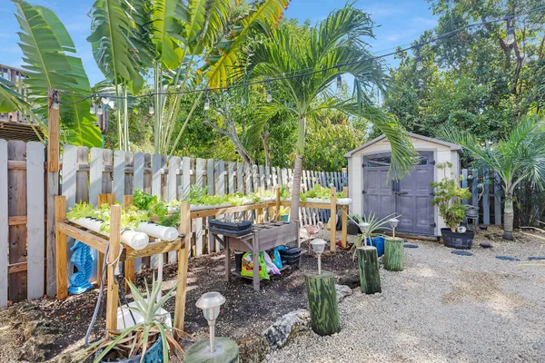 a outdoor living space with furniture and a garden