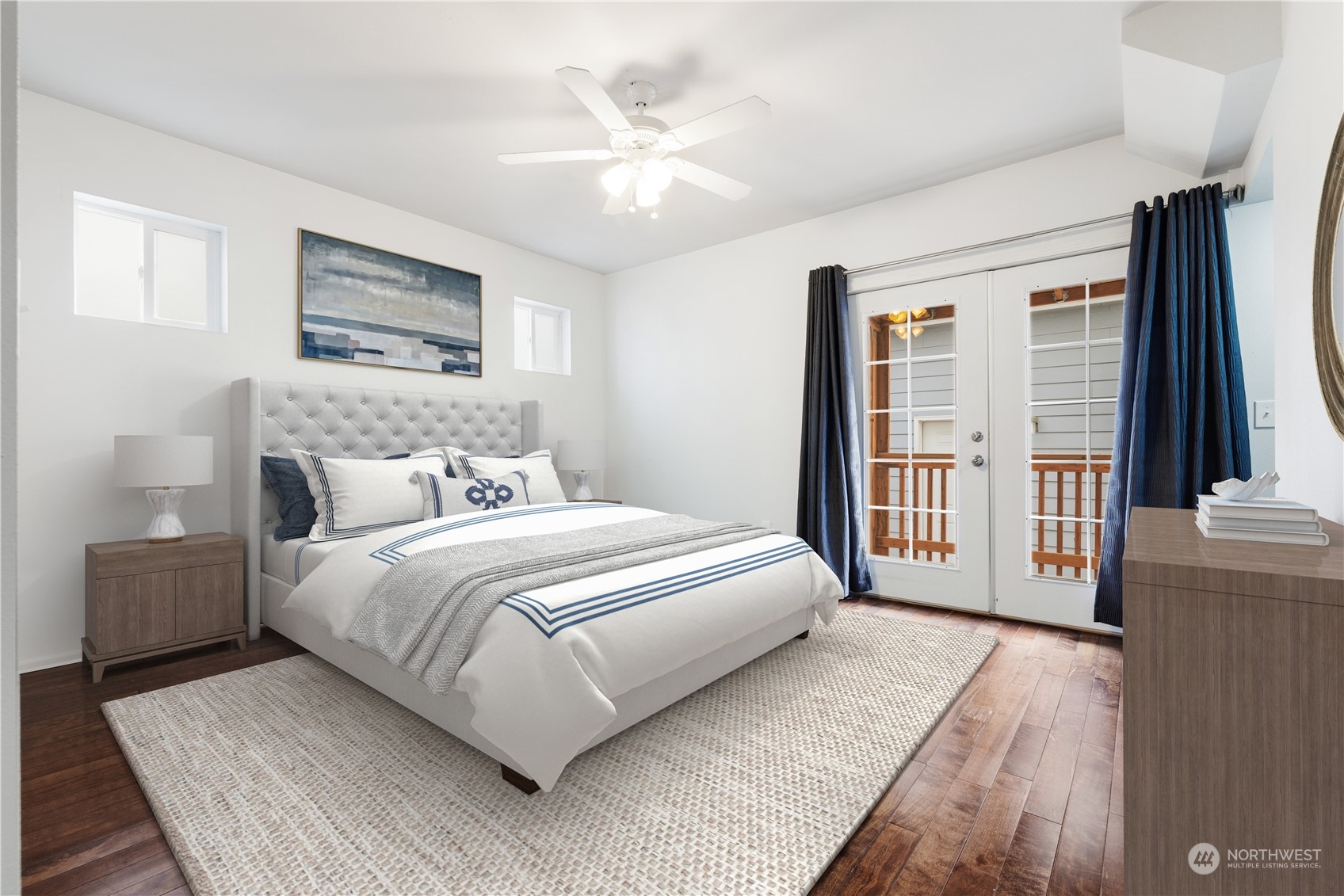 909 North 32nd Street Renton, WA 98056 - Photo 8 of 21 a bedroom with a large bed and a large window