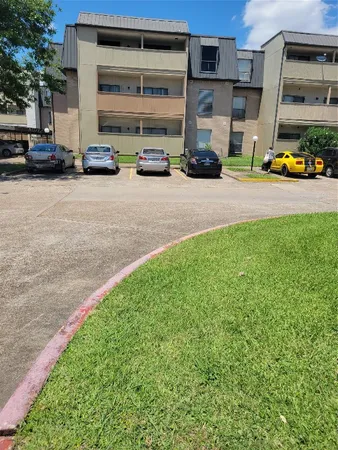 a view of a street with cars