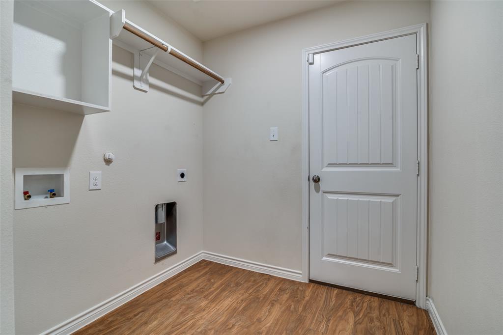 3504 Robin Road Ennis, TX 75119 - Photo 14 of 27 a view of empty room with wooden floor