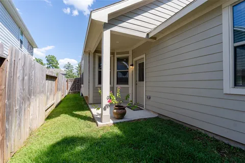 a view of a back yard of the house