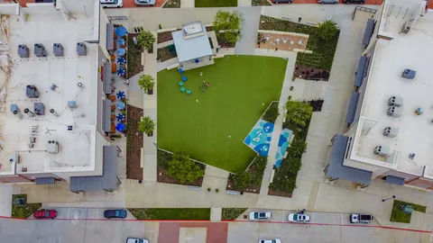a view of a cafe with sitting area
