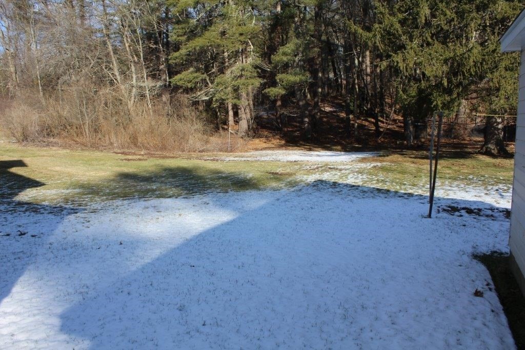 737 Worcester Road Barre, MA 01005 - Photo 15 of 19 a view of a yard with wooden fence
