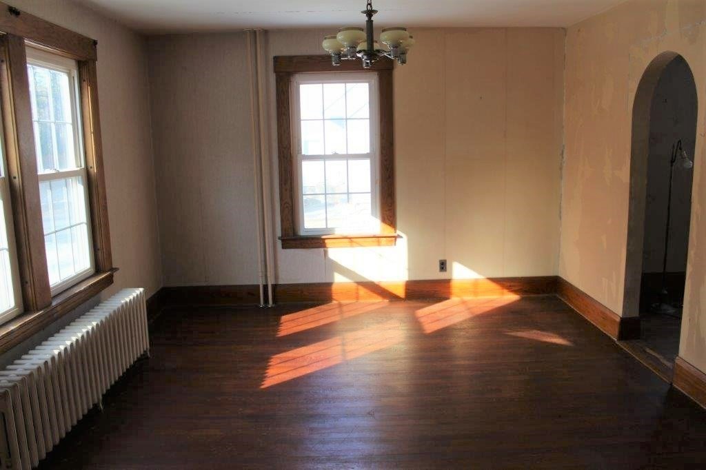 737 Worcester Road Barre, MA 01005 - Photo 4 of 19 a view of a room with wooden floor and a window