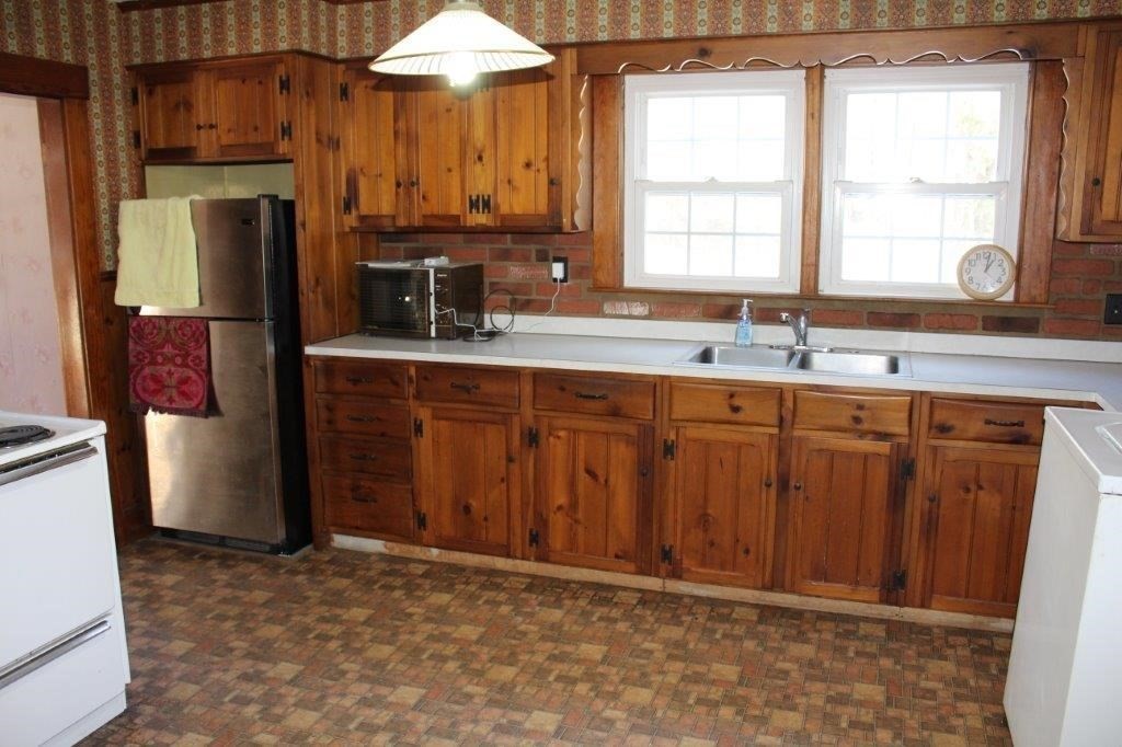 737 Worcester Road Barre, MA 01005 - Photo 10 of 19 a kitchen with stainless steel appliances granite countertop a refrigerator and a sink