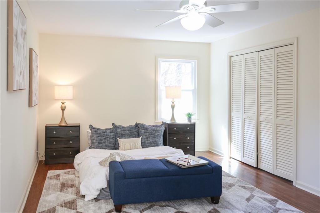 3969 Briaridge Circle Atlanta, GA 30340 - Photo 21 of 35 a living room with furniture and a lamp