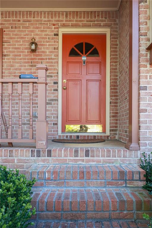 3969 Briaridge Circle Atlanta, GA 30340 - Photo 4 of 35 a front view of a house with a yard