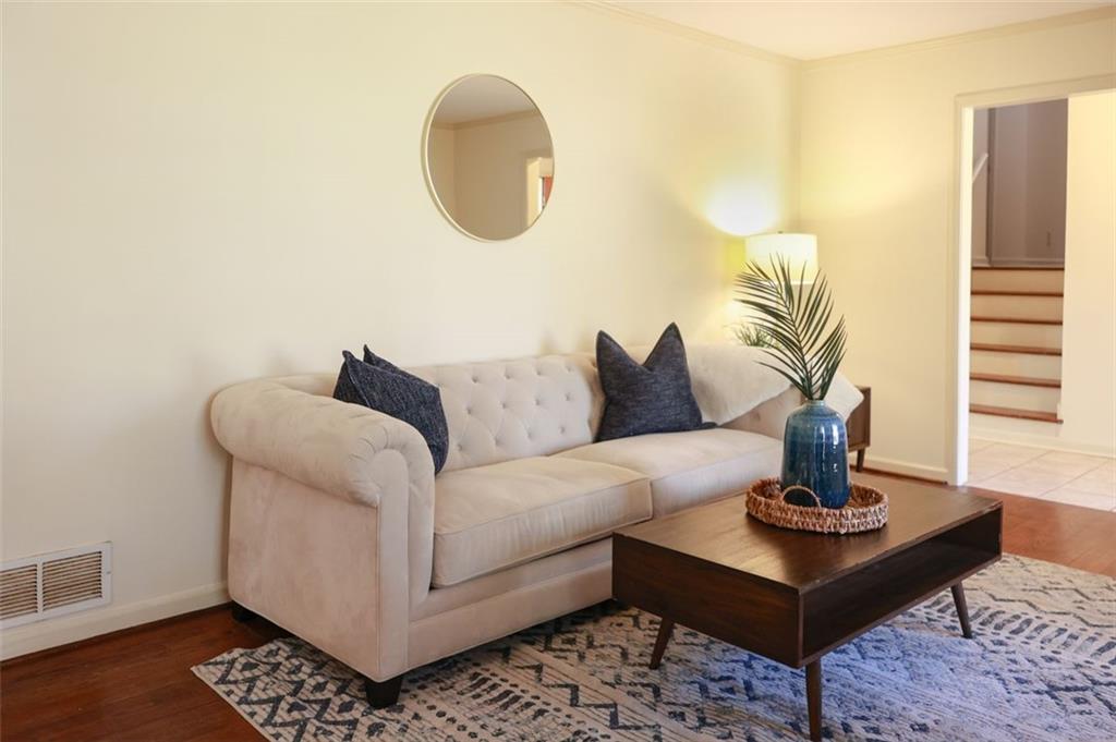 3969 Briaridge Circle Atlanta, GA 30340 - Photo 9 of 35 a living room with furniture and a potted plant