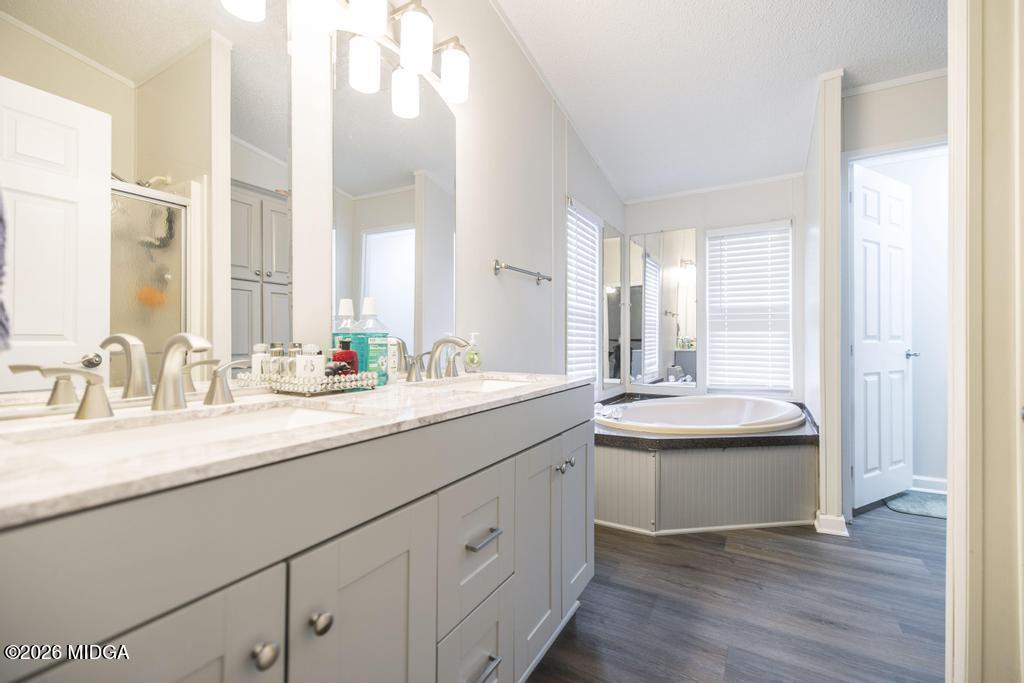 319 Pope Road Roberta, GA 31078 - Photo 20 of 42 a bathroom with a double vanity sink and a mirror