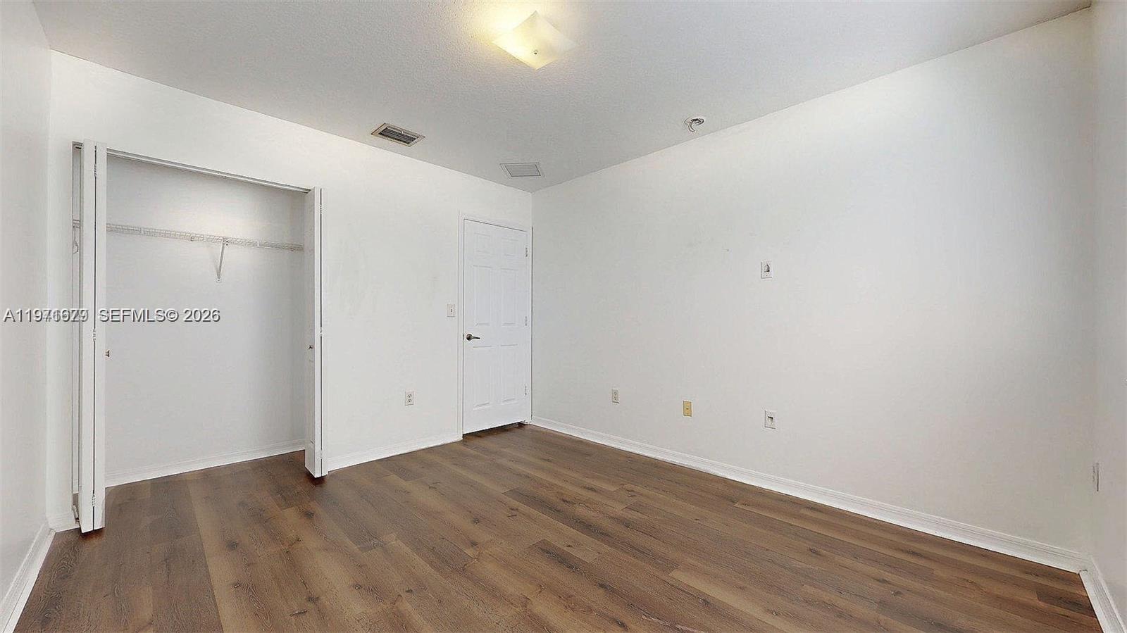 14162 Southwest 260th Street, Unit 104 Homestead, FL 33032 - Photo 28 of 35 a view of empty room