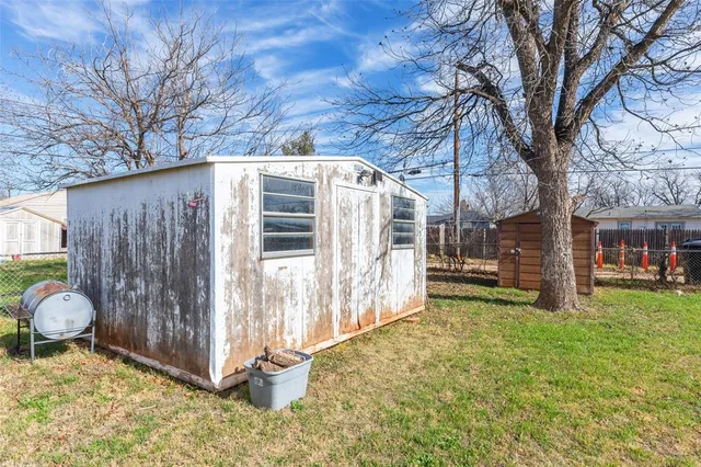 a view of a wooden door of a house