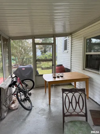 a room with furniture and a window