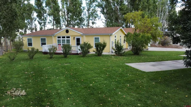 a bedroom with a bed and a view of bathroom