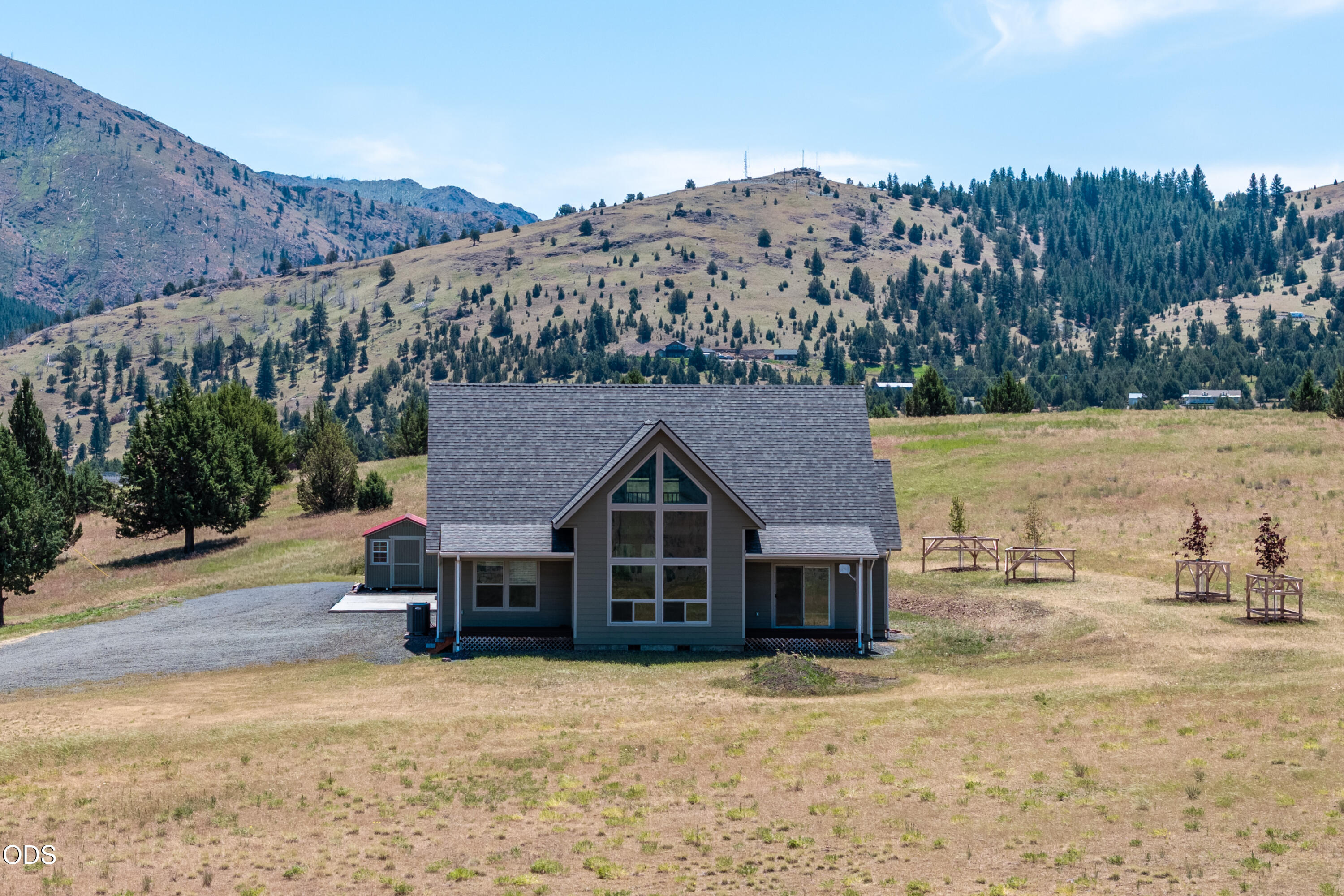 26216 West Bench Road John Day, OR 97845 - Photo 9 of 53 a view of a house with a ocean beach