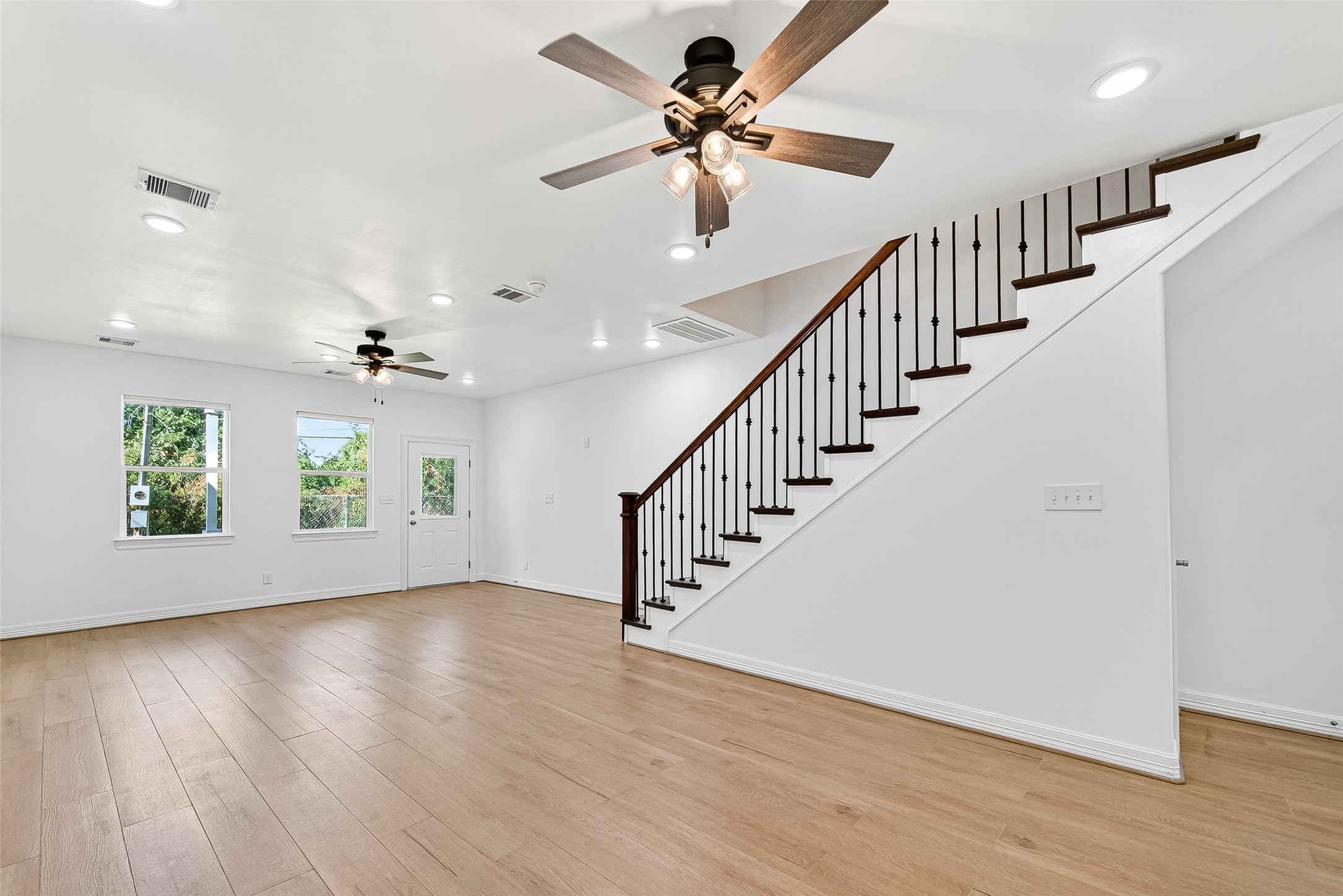716 Zoe Street Houston, TX 77020 - Photo 15 of 39 a view of an entryway with wooden floor