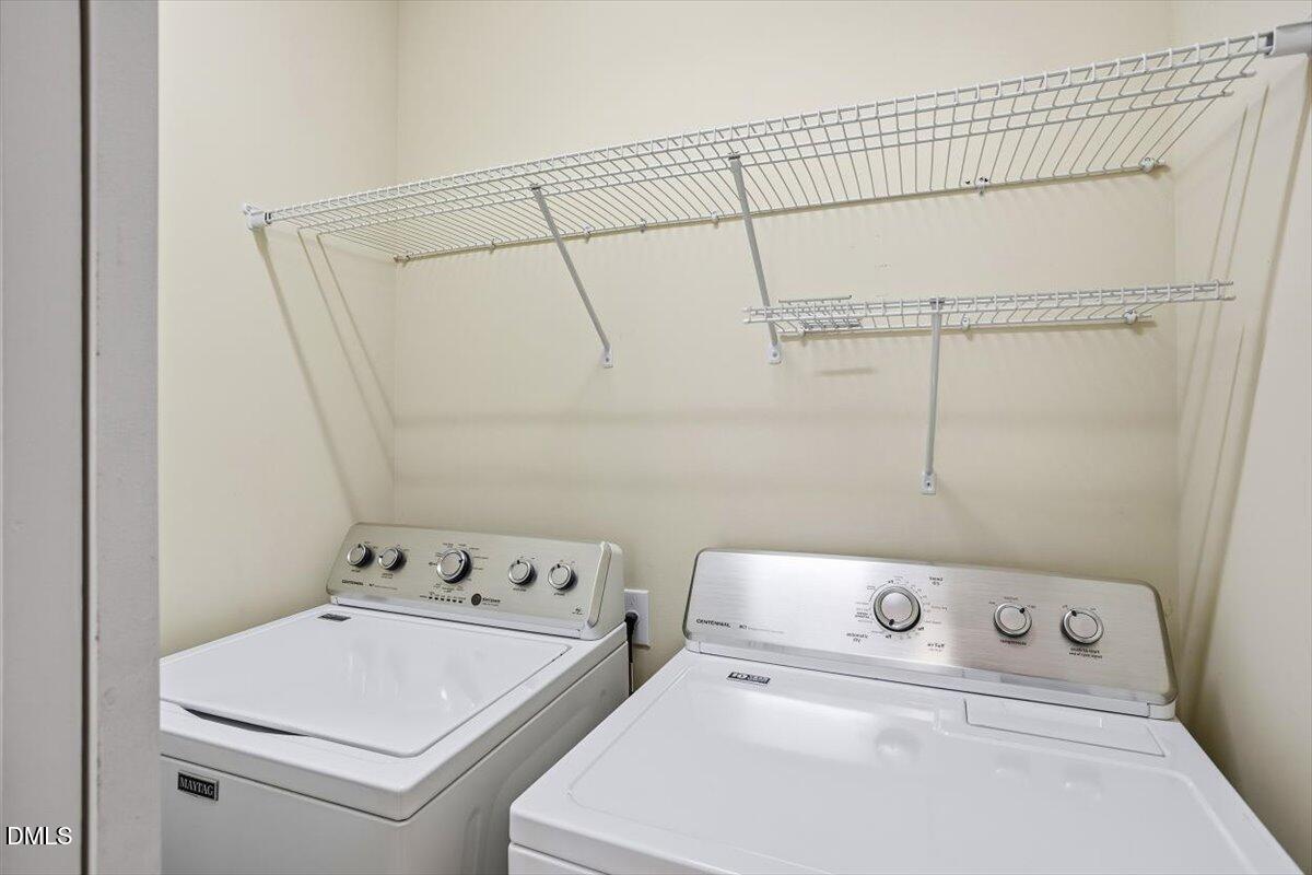 4409 Spiedie Court Raleigh, NC 27606 - Photo 19 of 33 a utility room with dryer and washer