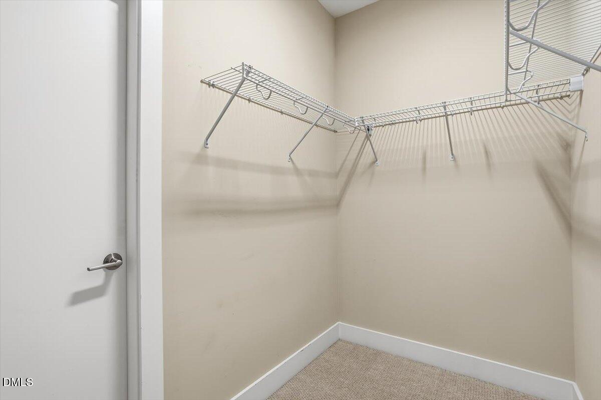 4409 Spiedie Court Raleigh, NC 27606 - Photo 21 of 33 a view of a room with racks on the wall