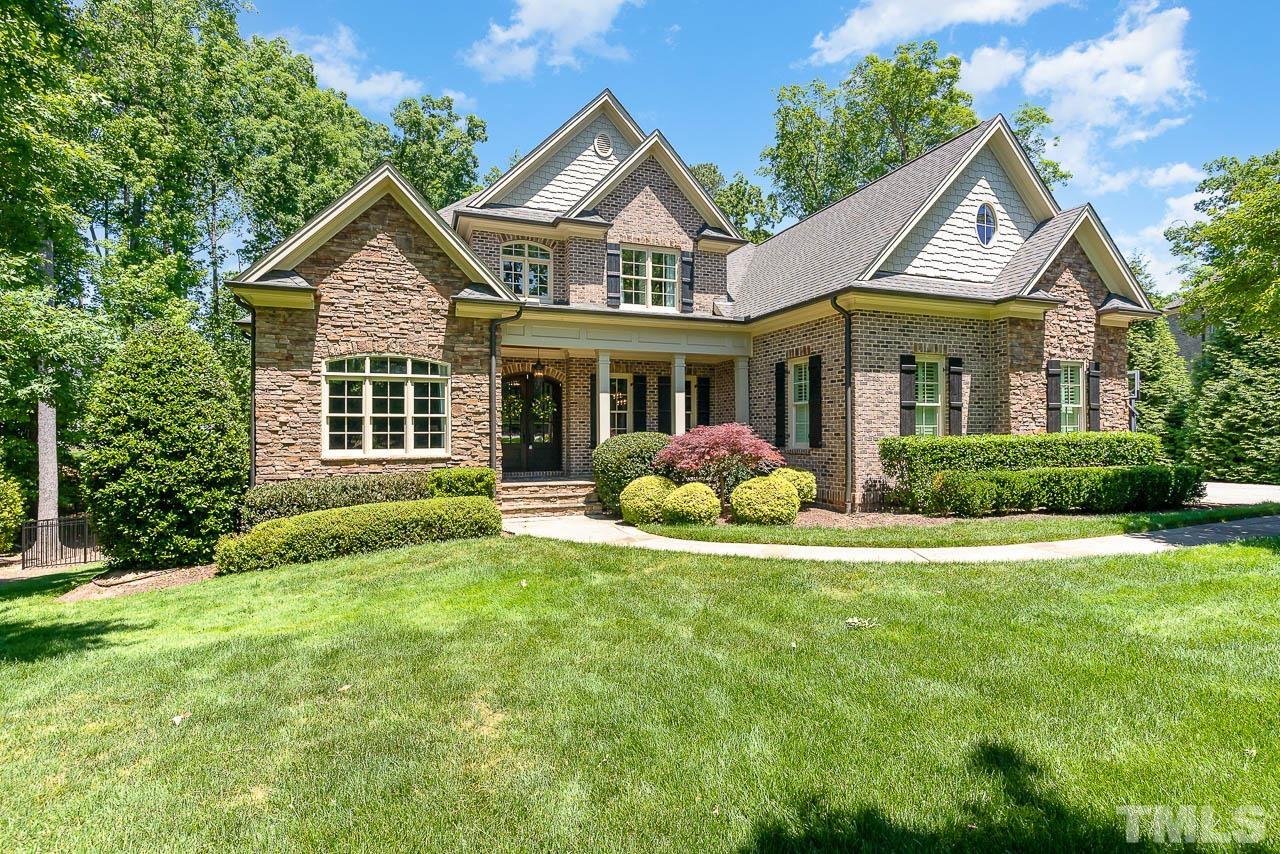 11308 Moonsprite Way Raleigh, NC 27614 - Photo 1 of 53 a front view of a house with a yard