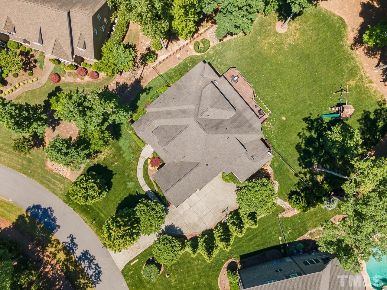 11308 Moonsprite Way Raleigh, NC 27614 - Photo 44 of 53 an aerial view of a house with a yard and lake view