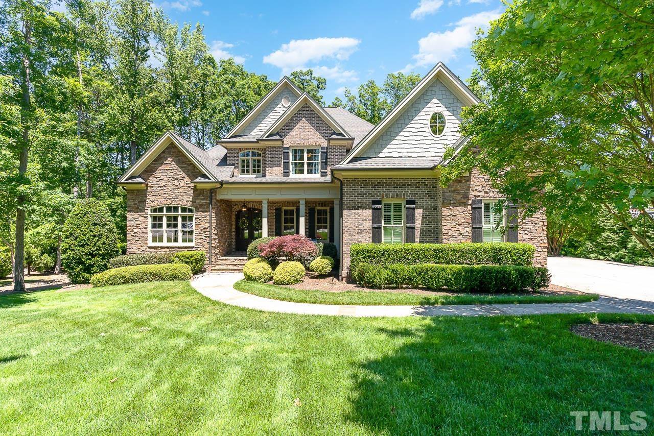 11308 Moonsprite Way Raleigh, NC 27614 - Photo 45 of 53 a front view of a house with a yard