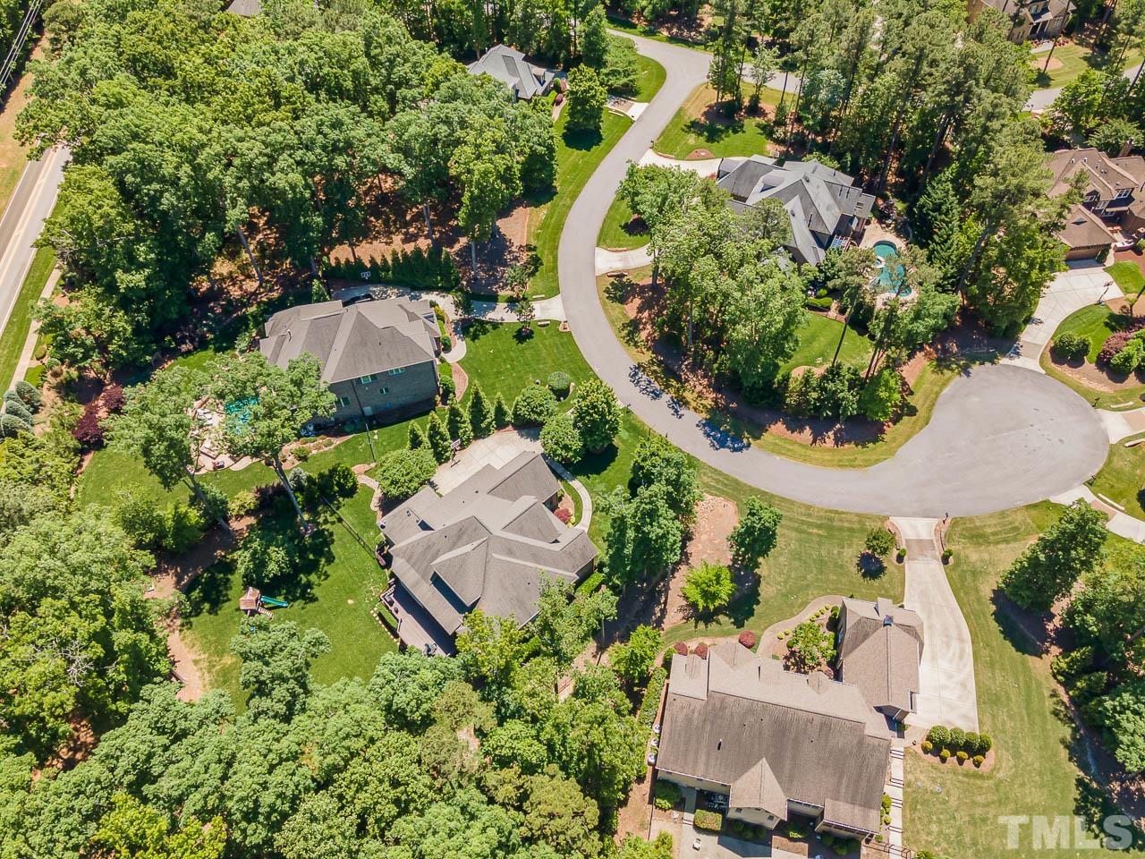 11308 Moonsprite Way Raleigh, NC 27614 - Photo 5 of 53 an aerial view of a swimming pool and outdoor space