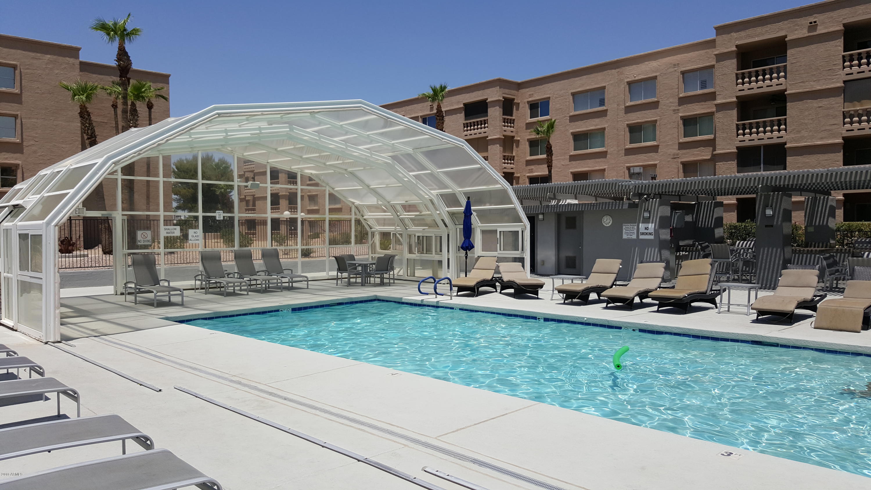 7820 East Camelback Road, Unit 310 Scottsdale, AZ 85251 - Photo 22 of 28 a front view of a building with sitting area