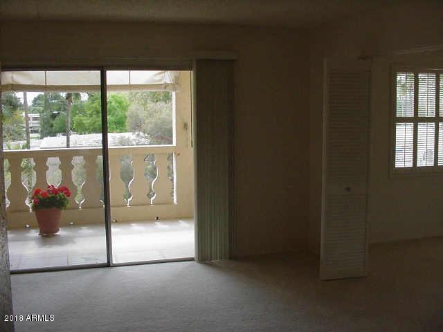 7820 East Camelback Road, Unit 310 Scottsdale, AZ 85251 - Photo 3 of 28 a view of water heater room with a floor to ceiling window