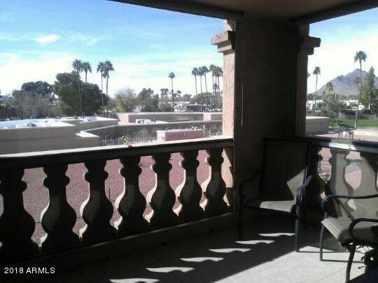 7820 East Camelback Road, Unit 310 Scottsdale, AZ 85251 - Photo 6 of 28 a view of roof deck with wooden floor and seating space