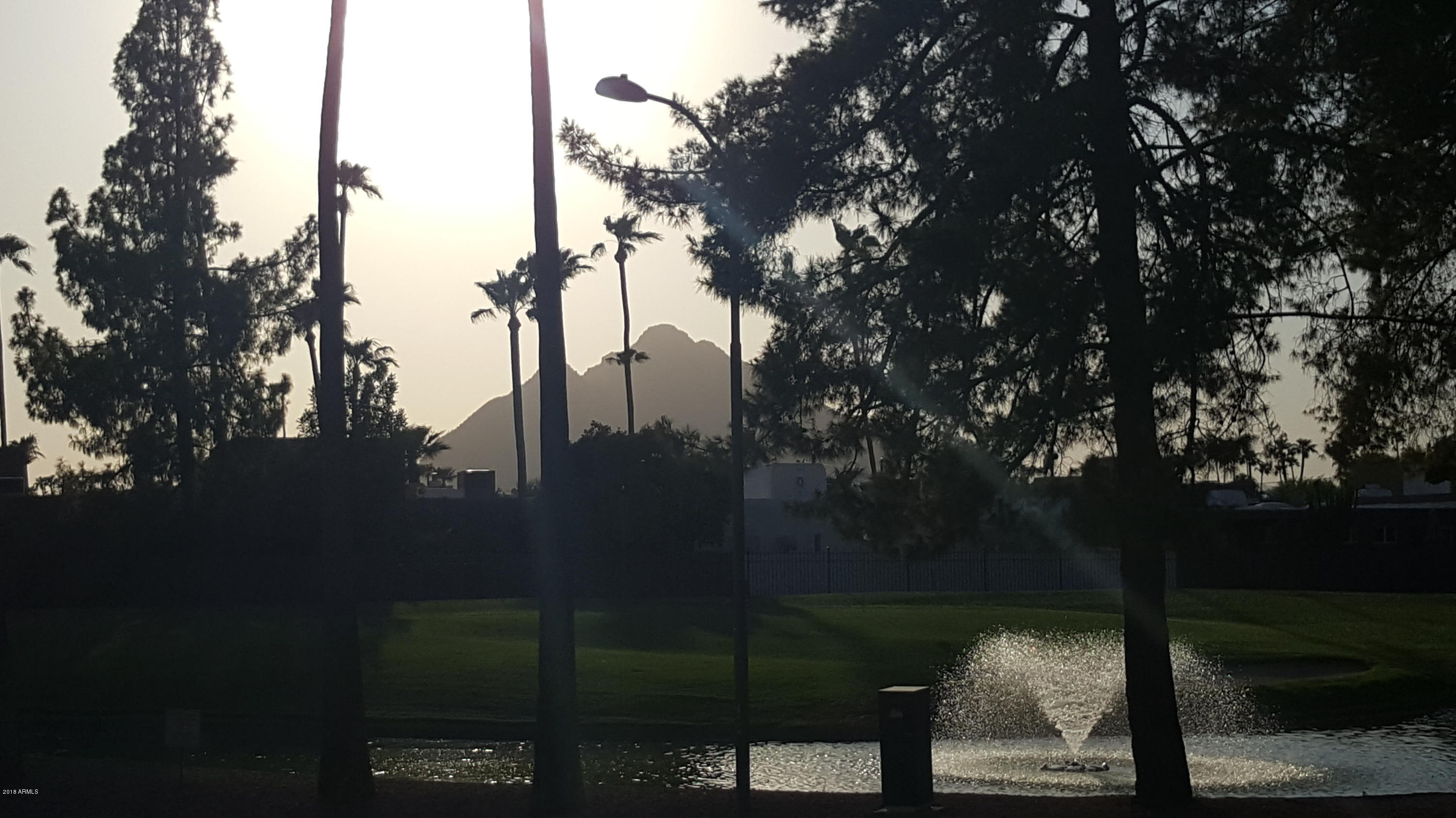7820 East Camelback Road, Unit 310 Scottsdale, AZ 85251 - Photo 9 of 28 a view of lake from balcony